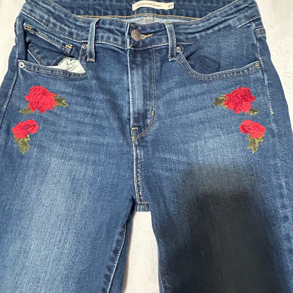 Levi skinny jeans with embroidery roses